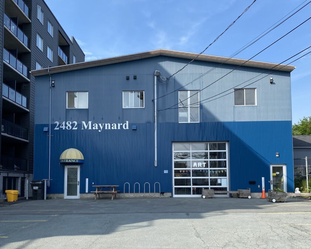A blue building in an urban setting